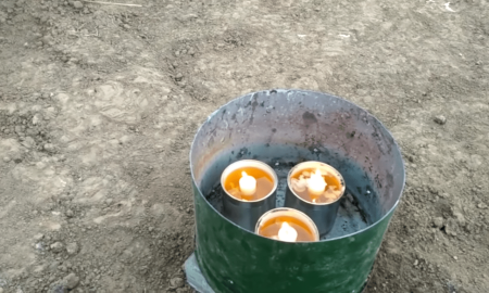 Свеча в ведре для обогрева теплицы