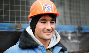 Мигрант-рабочий в городе