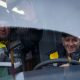 Водитель автобуса и его напарник